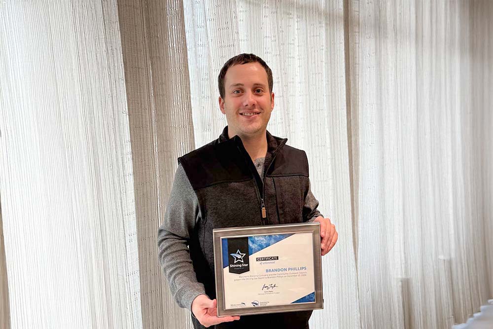 Shining Star runner-up Brandon Phillips holding certificate